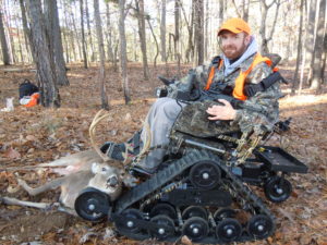 wounded veteran in a tank chair on a mobility Impaired Hunt